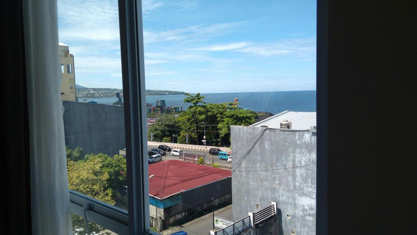 Green Eden Hotel Manado Zimmer foto